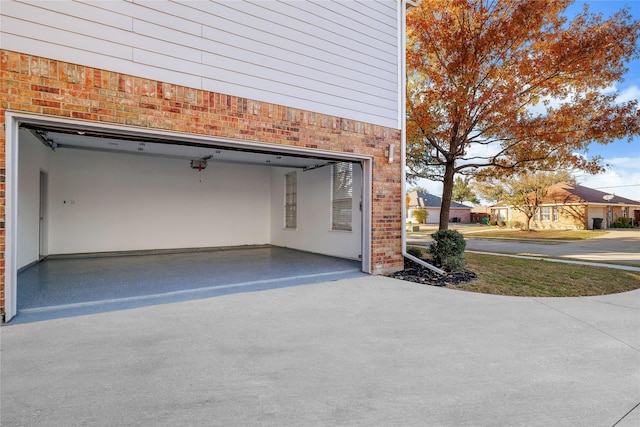 garage featuring driveway