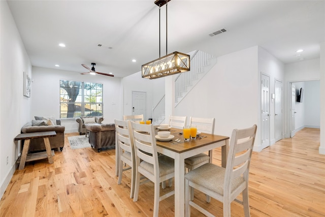dining room featuring recessed lighting, stairway, visible vents, a ceiling fan, and light wood-style flooring