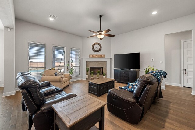 351 Evening Fire Dr, Waxahachie, TX 75167 - living room featuring wood finished floors, visible vents, a ceiling fan, and baseboards