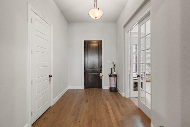 351 Evening Fire Dr, Waxahachie, TX 75167 - foyer with hardwood / wood-style flooring, baseboards, and french doors
