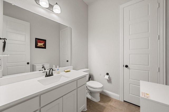 351 Evening Fire Dr, Waxahachie, TX 75167 - bathroom featuring baseboards, vanity, tile patterned flooring, and toilet