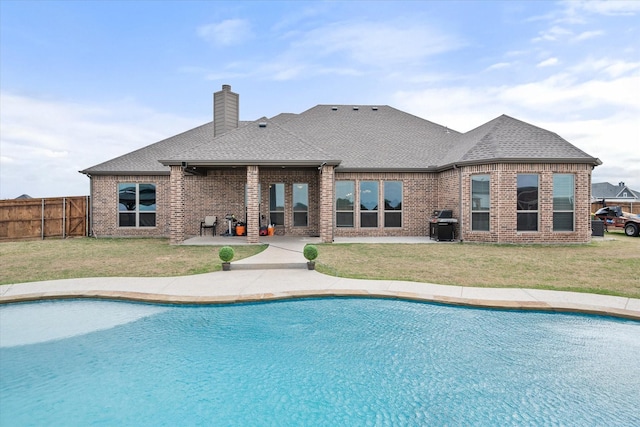 351 Evening Fire Dr, Waxahachie, TX 75167 - view of swimming pool with fence, a lawn, and a fenced in pool