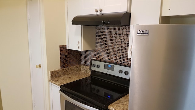 4859 Cedar Springs Rd Unit 358, Dallas, TX 75219 - kitchen with appliances with stainless steel finishes, under cabinet range hood, tasteful backsplash, white cabinetry, and light stone counters