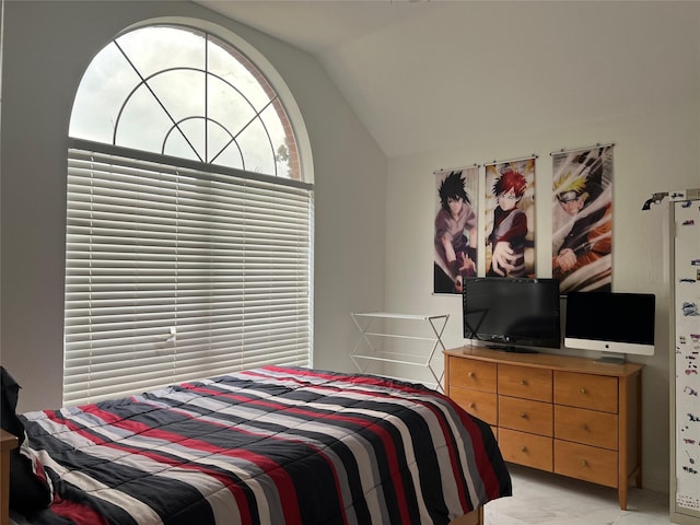 bedroom with vaulted ceiling