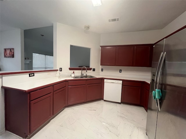 kitchen with a sink, dishwasher, marble finish floor, stainless steel refrigerator with ice dispenser, and visible vents