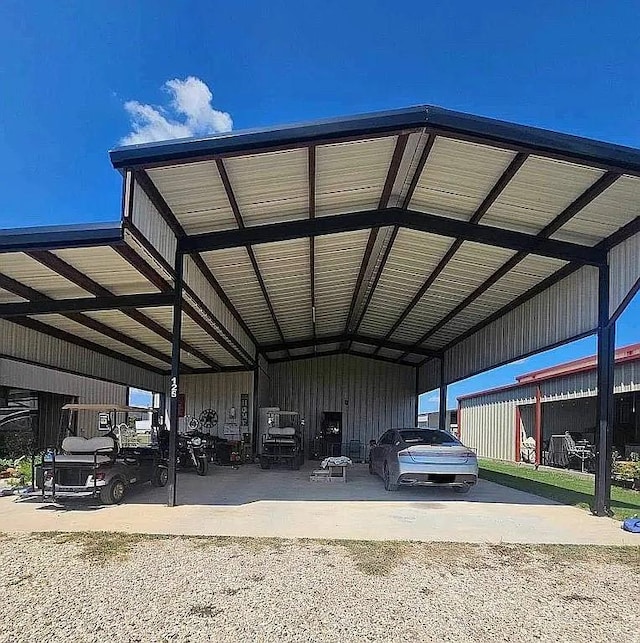 view of vehicle parking featuring a carport