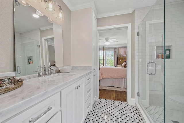 full bathroom with ensuite bathroom, a shower stall, ornamental molding, and a ceiling fan