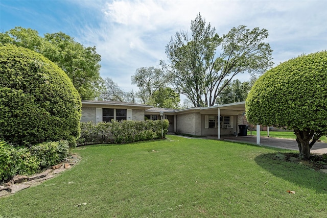 view of yard featuring an attached carport