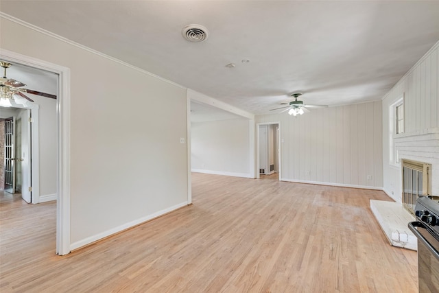 unfurnished living room featuring ceiling fan, light wood-style floors, and visible vents