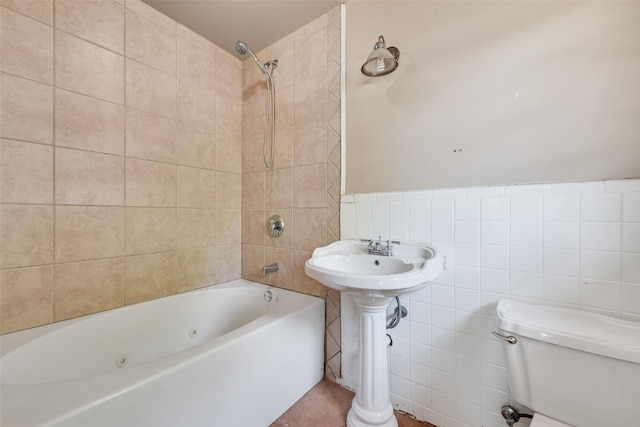 full bathroom featuring tile walls,  shower combination, and toilet