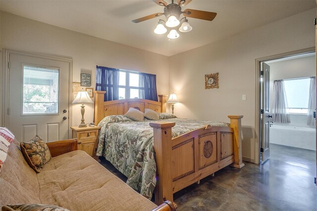 bedroom with a ceiling fan, multiple windows, and finished concrete flooring