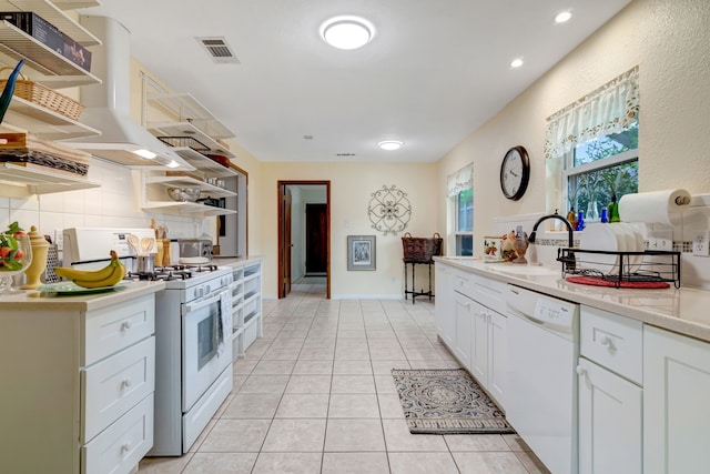 1806 Elm Crest Dr, Arlington, TX 76012 - kitchen featuring open shelves, white appliances, a sink, light countertops, and recessed lighting