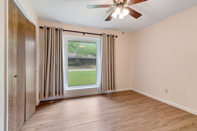 1806 Elm Crest Dr, Arlington, TX 76012 - empty room with light wood finished floors, baseboards, and ceiling fan