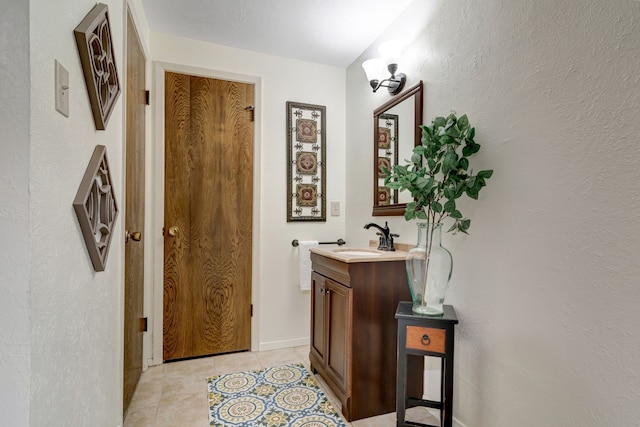 1806 Elm Crest Dr, Arlington, TX 76012 - doorway to outside featuring a sink, light tile patterned floors, and baseboards