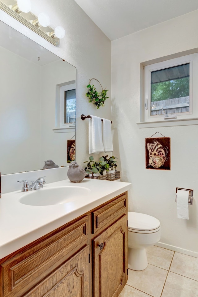 1806 Elm Crest Dr, Arlington, TX 76012 - bathroom featuring tile patterned floors, vanity, and toilet