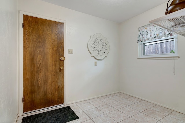 1806 Elm Crest Dr, Arlington, TX 76012 - interior space featuring light tile patterned floors and baseboards