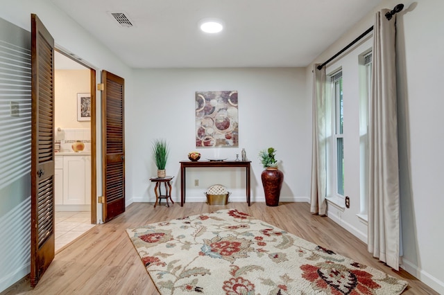 1806 Elm Crest Dr, Arlington, TX 76012 - sitting room featuring wood finished floors and baseboards