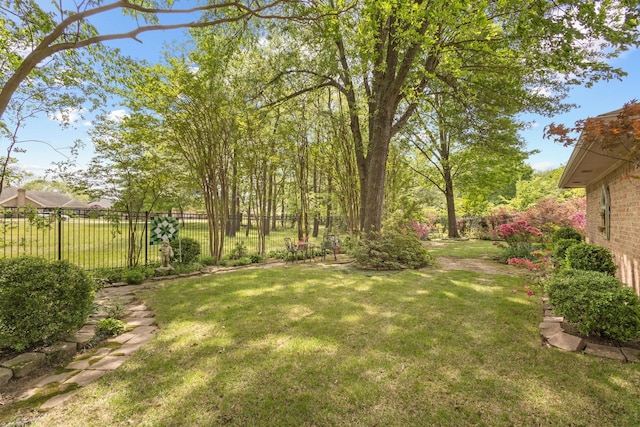 view of yard featuring fence