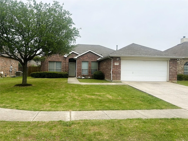 ranch-style house featuring cooling unit, an attached garage, driveway, brick siding, and a front yard