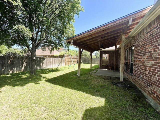 4303 Grassy Glen Dr, Corinth, TX 76208 - view of yard featuring ceiling fan and a patio area