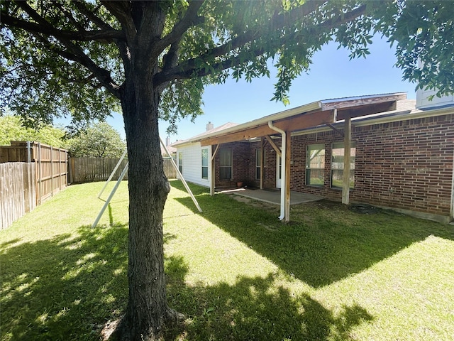 4303 Grassy Glen Dr, Corinth, TX 76208 - view of yard featuring a patio area