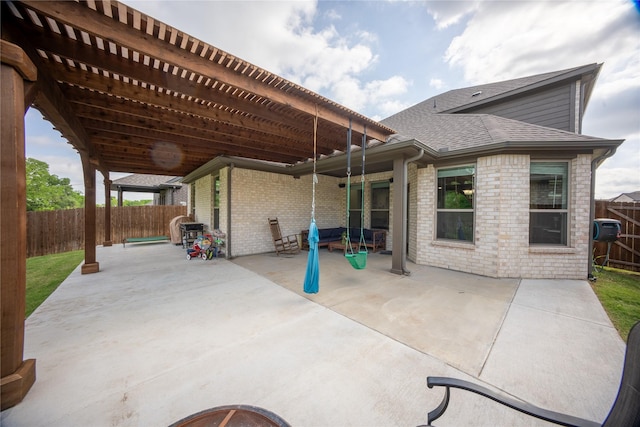 view of patio with a fenced backyard and a pergola
