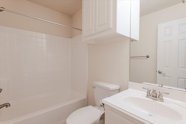 bathroom featuring toilet, vanity, and shower / bath combination