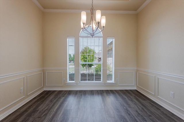 unfurnished dining area with dark wood-type flooring, a decorative wall, ornamental molding, and a notable chandelier
