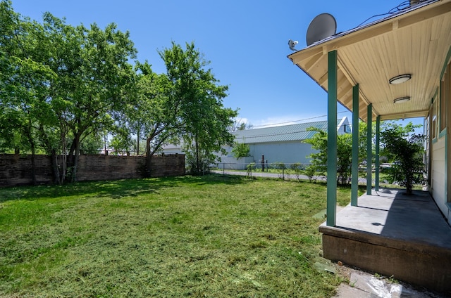 view of yard with a fenced backyard and a patio