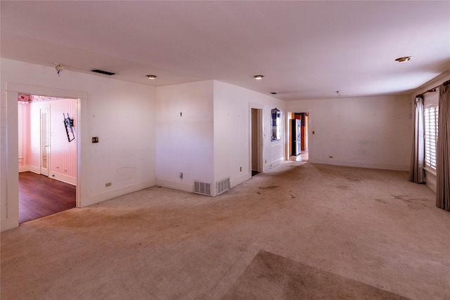 602 E Beauregard St, Rotan, TX 79546 - carpeted spare room with visible vents and baseboards