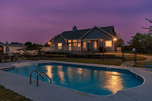 view of swimming pool with a fenced in pool, a patio area, and fence