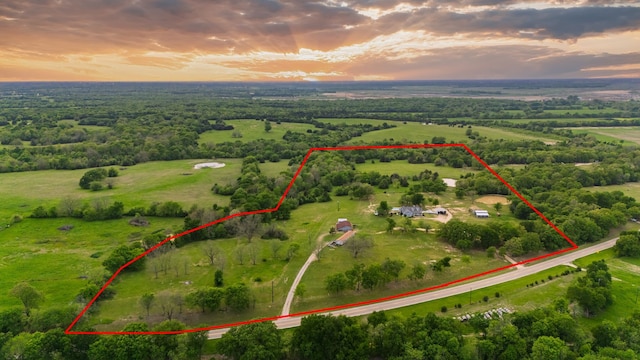 aerial view at dusk with a rural view