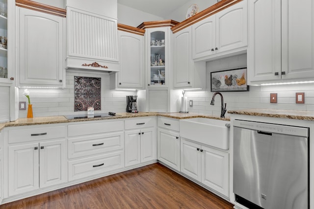 kitchen featuring black electric cooktop, backsplash, dishwasher, a sink, and custom range hood