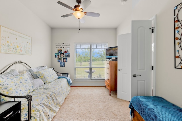bedroom with carpet flooring and ceiling fan
