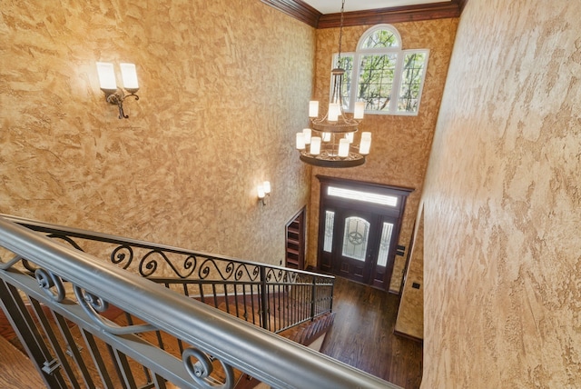 200 Leea Ln, Weatherford, TX 76087 - foyer entrance with wood finished floors and an inviting chandelier