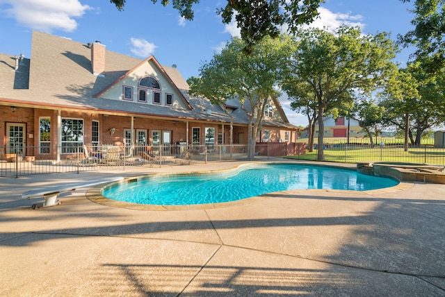 200 Leea Ln, Weatherford, TX 76087 - view of swimming pool with a pool with connected hot tub, a patio, and fence