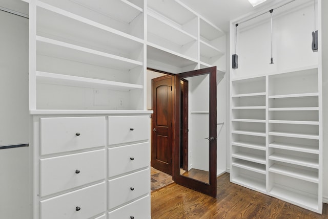 200 Leea Ln, Weatherford, TX 76087 - walk in closet with dark wood finished floors