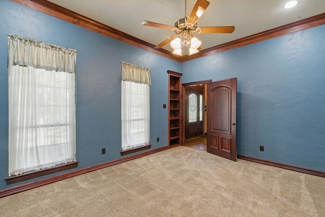 200 Leea Ln, Weatherford, TX 76087 - interior space with a ceiling fan, carpet floors, and ornamental molding