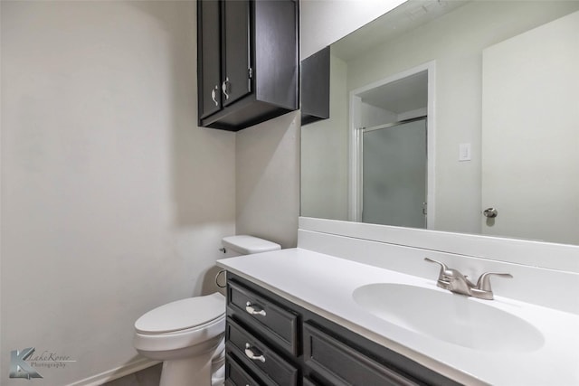 1026 Baylor St, Abilene, TX 79602 - bathroom featuring a stall shower, vanity, and toilet