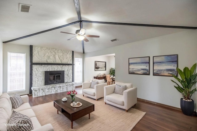 1026 Baylor St, Abilene, TX 79602 - living area featuring a healthy amount of sunlight, baseboards, visible vents, and wood finished floors