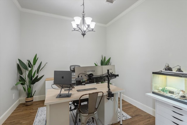 office space with baseboards, an inviting chandelier, ornamental molding, and wood finished floors