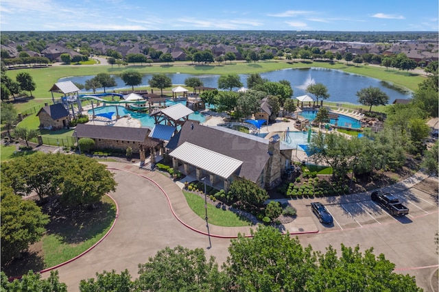 10524 Musketball Pl, Mckinney, TX 75072 - bird's eye view of a pool and a nearby body of water
