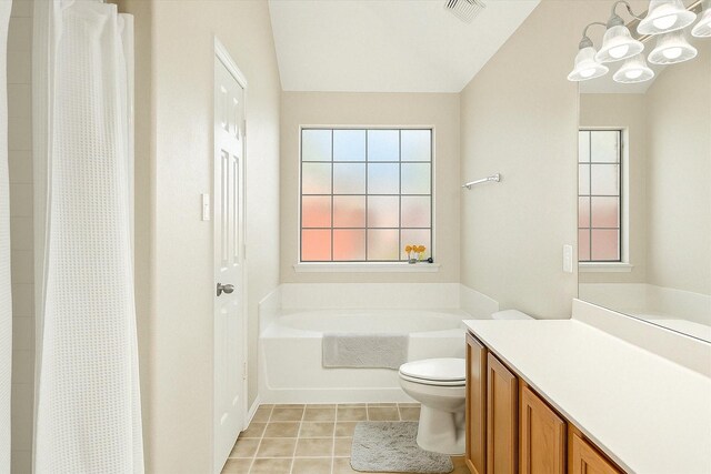4823 Topaz Ln, Granbury, TX 76049 - full bath featuring a bathing tub, lofted ceiling, toilet, a notable chandelier, and visible vents