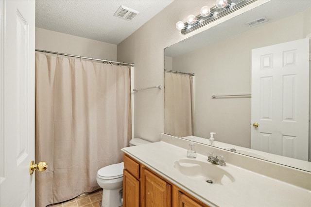 4823 Topaz Ln, Granbury, TX 76049 - full bathroom with toilet, vanity, a textured ceiling, and visible vents