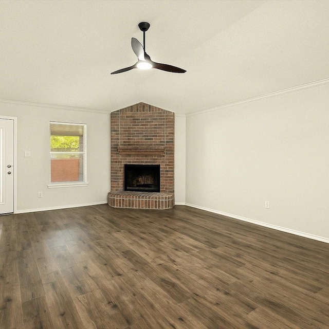 4823 Topaz Ln, Granbury, TX 76049 - unfurnished living room with dark wood finished floors, ornamental molding, and a ceiling fan
