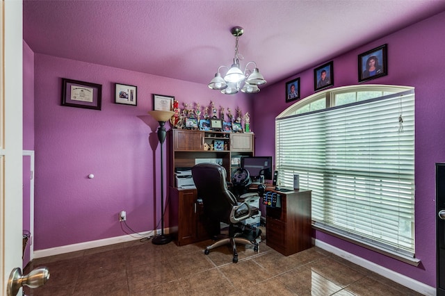 tiled office featuring baseboards and a notable chandelier