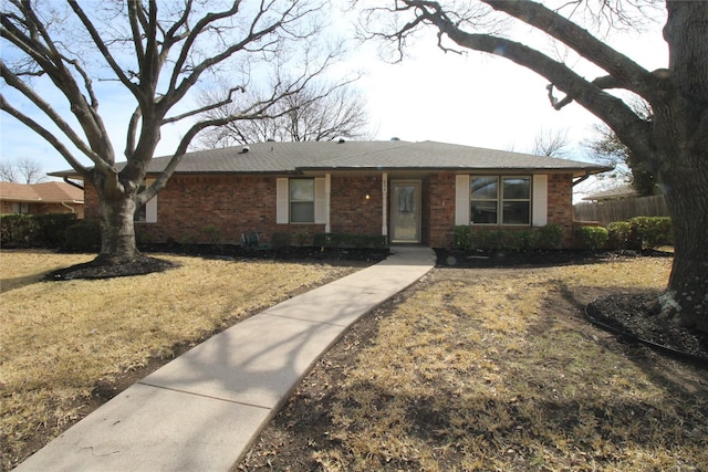 634 Ray Ave, Desoto, TX 75115 - single story home with brick siding, a front yard, and fence