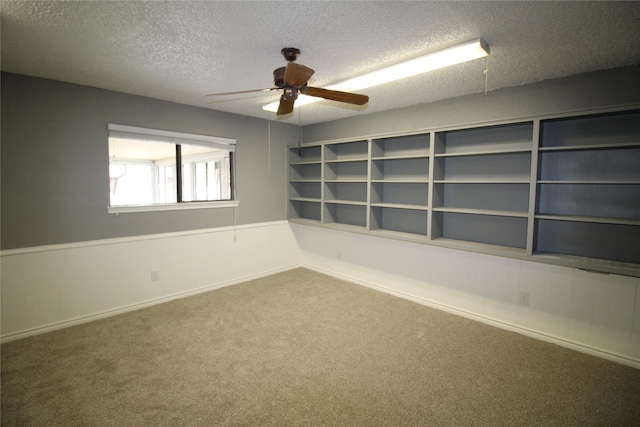 634 Ray Ave, Desoto, TX 75115 - carpeted spare room featuring a ceiling fan and a textured ceiling