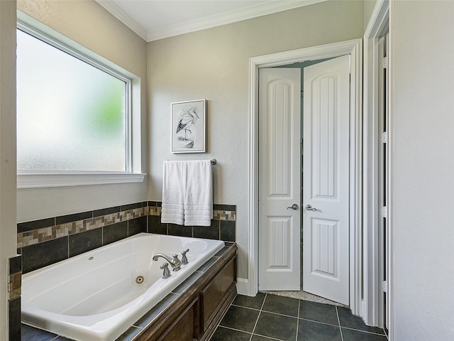 full bathroom featuring crown molding, tile patterned flooring, and a tub with jets