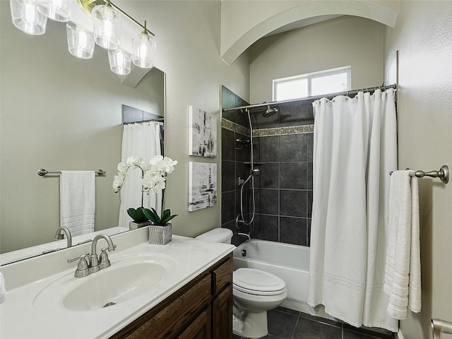 bathroom featuring shower / tub combo, tile patterned floors, vanity, and toilet